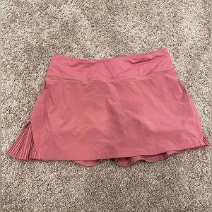 Pink Lululemon tennis skirt with pleats, size 6